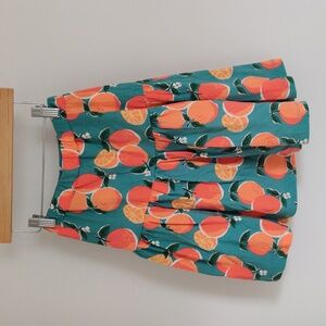 Mini Boden, size 7/8 blue skirt with oranges